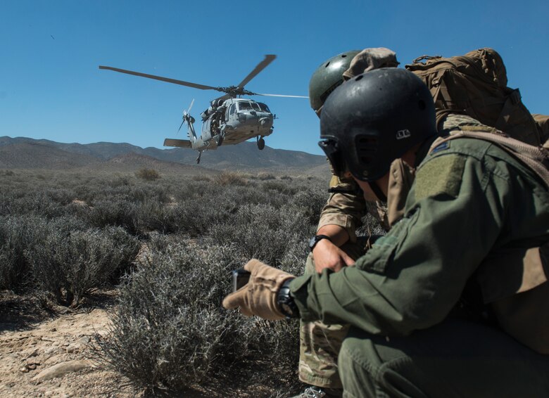 A Sikorsky HH-60 Pave Hawk prepares to land at the Nevada Test and Training Range, Nevada July 30, 2015. During Red Flag 15-3 the Pave Hawk was just one of multiple aircraft involved during a simulated rescue mission for a downed pilot.. (U.S. Air Force photo by Brittany A. Chase)