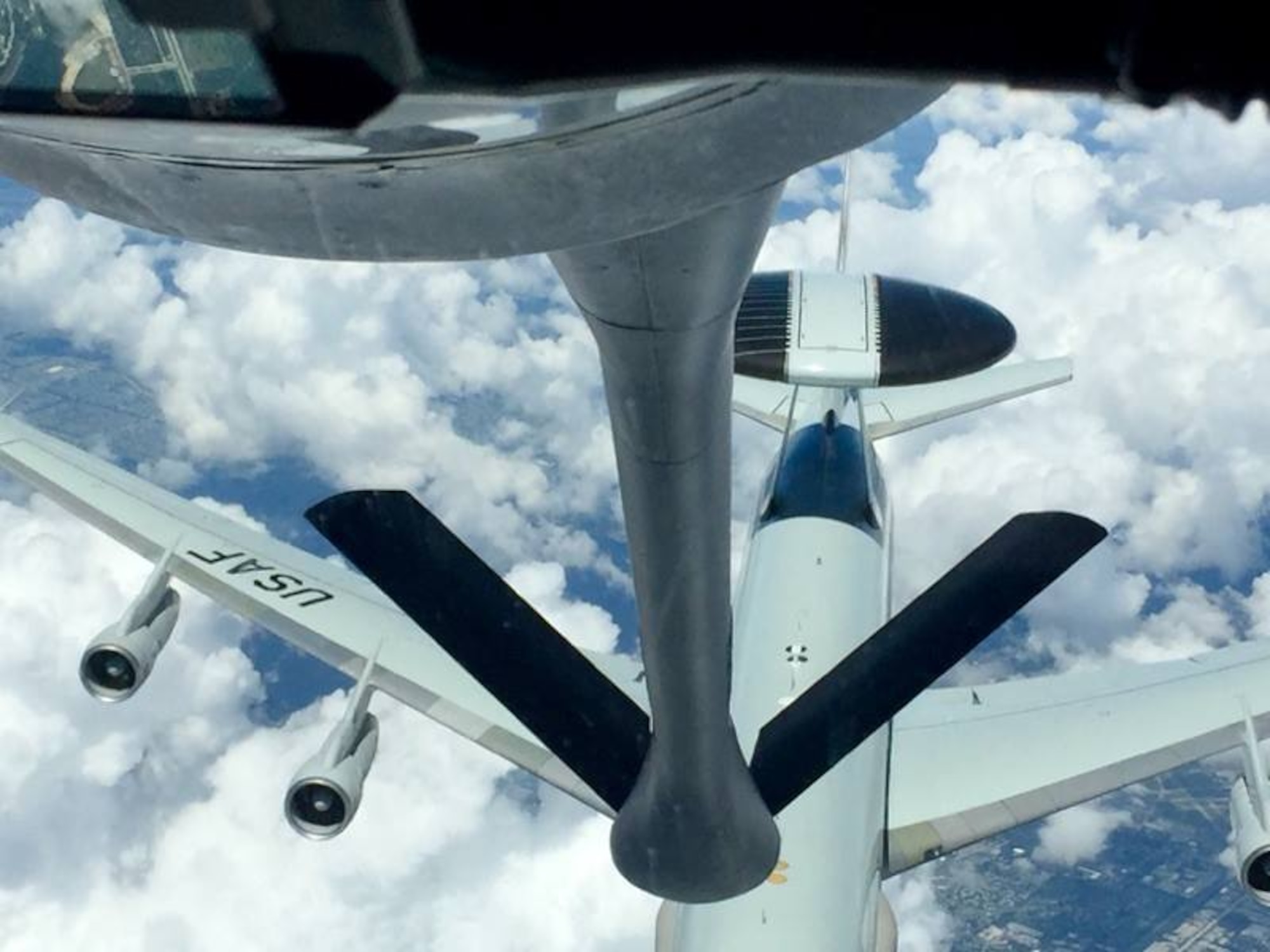 A KC-135 from MacDill Air Force Base refuels an E-3 Sentry Airborne Warning and Control System (AWACS) during a boss lift for 927th Air Refueling Wing reservists employers and local civic leaders. The Boss lift program at MacDill AFB, is a joint program between the 927th ARW and state committee members from the Employer Support of the Guard and Reserve. (Courtesy photo by Ami Forte, Managing Partner at Morgan Stanley)