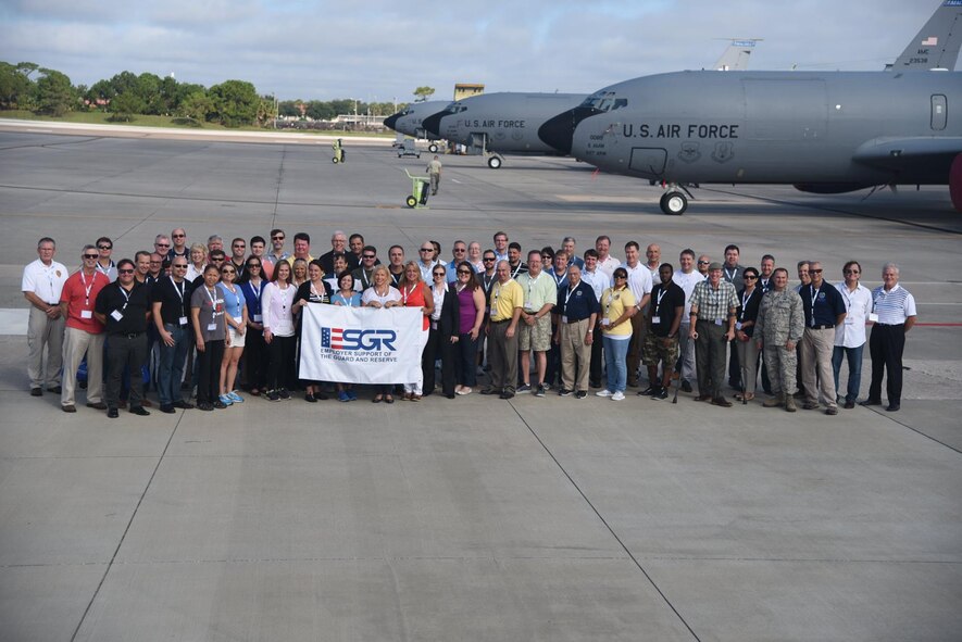 Over 70 civilian employers of 927th Air Refueling Wing Airman and community leaders from across the state, pose for a group photo on the flightline at MacDill AFB, Fla., Saturday, September 19, 2015. To further civilian employer and community understanding of the Wing’s mission and the sacrifices our Citizen Airmen make every day, participants were given the opportunity to take flight and witness the Airmen in action. (U.S. Air Force photo by Staff Sgt. Adam C. Borgman)