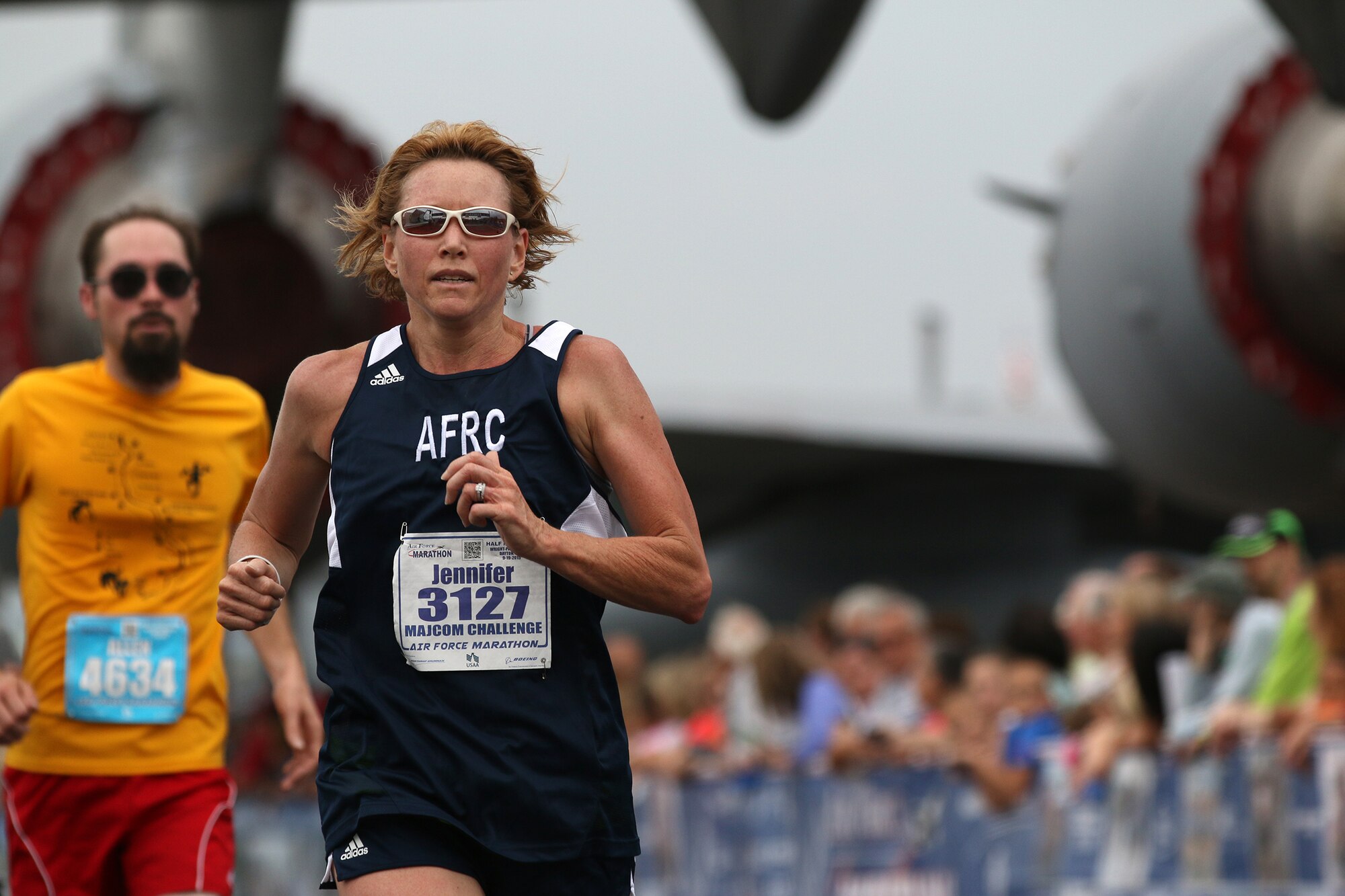 WRIGHT-PATTERSON AIR FORCE BASE, Ohio – Master Sgt. Jennifer L. Bartholomew, races towards the finish line in the 19th Annual Air Force Marathon held Sept. 19, 2015. Bartholomew was a member of the Air Force Reserve Command MAJCOM Challenge Team. The team consisted of traditional reservists, air reserve technicians, individual mobilization augmentees and Air Guard Reserve members. The MAJCOM challenge included six Airmen participating in the half marathon and four in the full marathon. (U.S. Air Force photo /Tech. Sgt. Patrick O’Reilly)