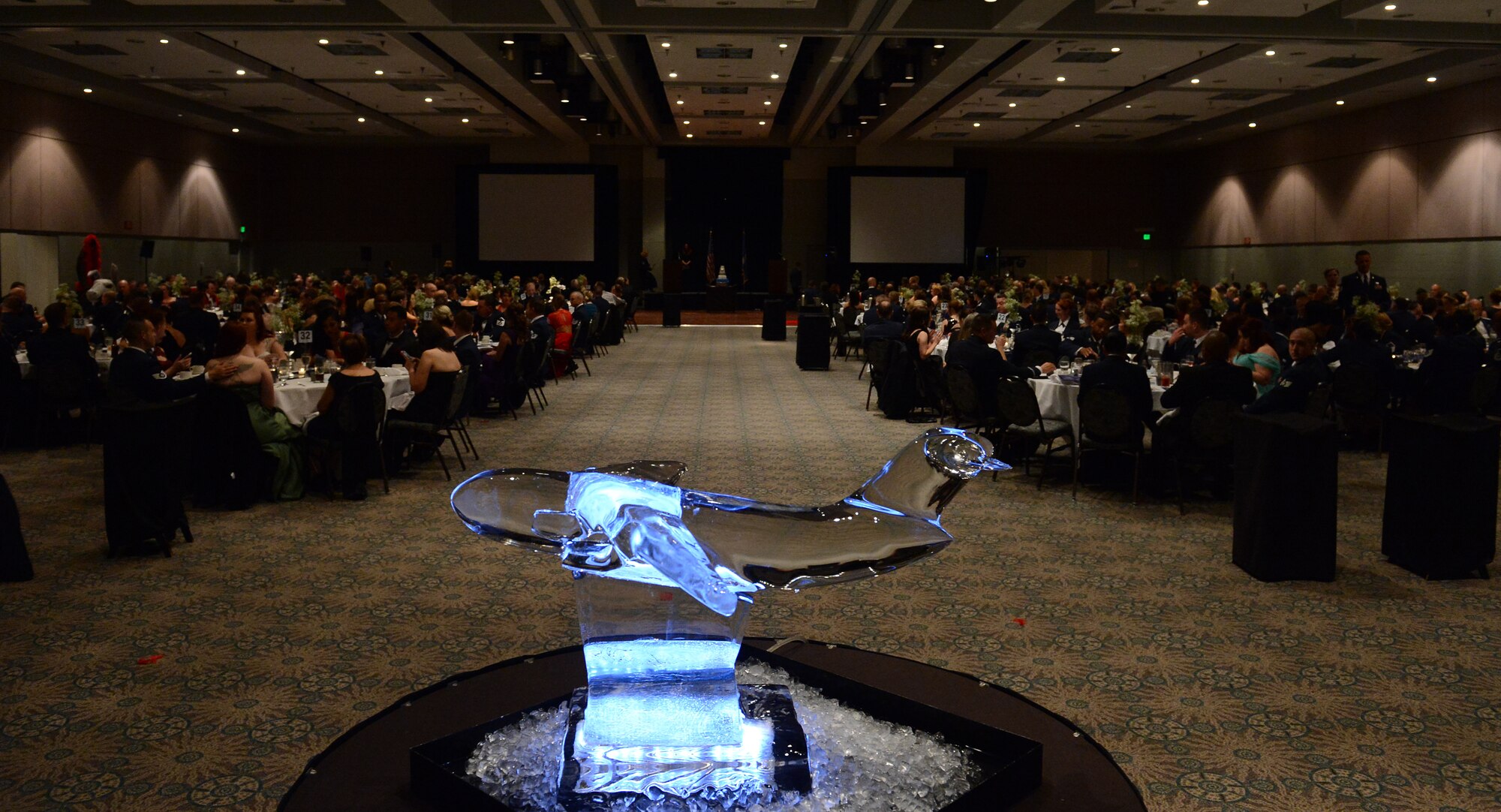 Attendees to the McChord Field Air Force Ball finish dinner Sept. 18, 2015, at Tacoma, Wash. More than 500 people from active duty, Air Force Reserves, the Air National Guard, the civilian sector and their guests attended the Ball. (U.S. Air Force photo/Staff Sgt. Tim Chacon)