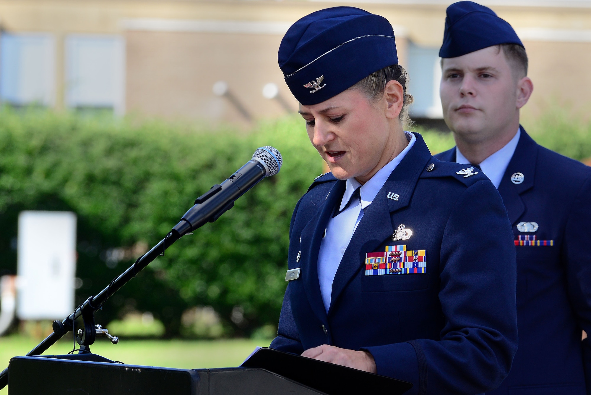 U.S. Air Force Col. Caroline Miller, 633rd Air Base Wing commander, speaks during the Joint Base Langley-Eustis, Va., Prisoner of War/Missing in Action Recognition Day Ceremony at Langley Air Force Base, Va., Sept. 18, 2015. The ceremony honored the nation’s POW/MIA Service members by paying tribute to those who made, and continue to make, the ultimate sacrifice. (U.S. Air Force photo by Senior Airman Kimberly Nagle/Released)  

