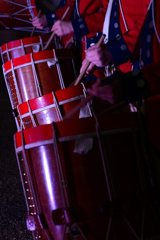 Colonial Williamsburg Fifes and Drums Corps drummers perform during the Constitution Day concert in Williamsburg, Va., Sept. 17, 2015. The corps performed independently and alongside the U.S. Air Force Heritage of America Band and the U.S. Army Training and Doctrine Command Band. (U.S. Air Force photo by Senior Airman Kimberly Nagle/Released) 