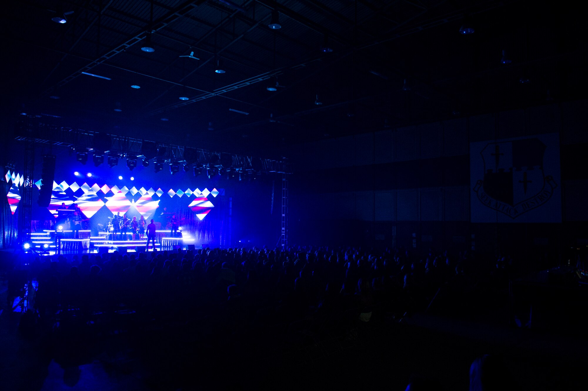Members of Tops in Blue perform for Spangdahlem community members in Hangar 1 at Spangdahlem Air Base, Germany, Sept. 22, 2015. More than 400 Spangdahlem community members watched Tops in Blue, the Air Force’s Premiere Expeditionary Entertainment unit, perform numerous musical and dancing routines. (U.S. Air Force photo by Airman 1st Class Luke Kitterman/Released)