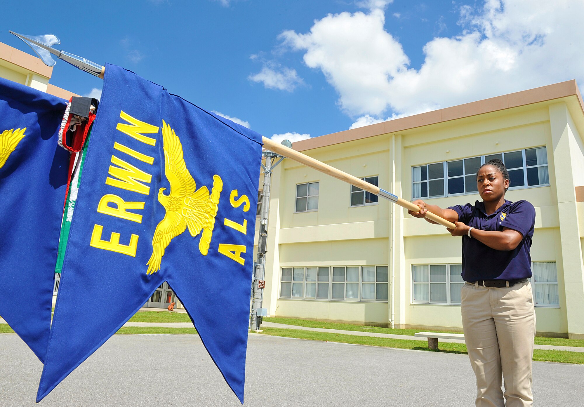U.S. Air Force Staff Sgt. Michelle Jenkins, Erwin Professional Military Education Center instructor, practices drill at the Erwin PME Center Sept. 18, 2015, on Kadena Air Base, Japan. Jenkins received the Chief's Choice Award for the month of August for her outstanding professionalism, customs, courtesies, bearing and civic contributions to Kadena and the local community. Jenkins's goal in the Air Force is to become an officer or chief master sergeant. (U.S. Air Force photo by Naoto Anazawa)


