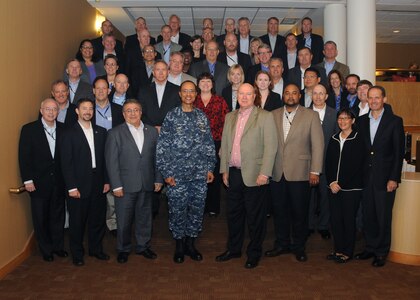 U.S. Navy Adm. Cecil D. Haney (front center), U.S. Strategic Command commander, poses for a photo with members of APEX 41, a Department of Defense Senior Executive Service (SES) orientation program, during their visit to Offutt Air Force Base, Neb., Sept. 23, 2015. The APEX program provides newly appointed senior executives with both a practical and theoretical understanding of the structure and processes of the Office of the Secretary of Defense; the Combatant Commands, including USSTRATCOM; the Joint Staff; and the military departments. The program also helps civilian leaders gain an enterprise-wide perspective that encompasses expectations, opportunities and challenges currently facing DoD. USSTRATCOM, one of nine DoD unified combatant commands, is charged with strategic deterrence; space operations; cyberspace operations; joint electronic warfare; global strike; missile defense; intelligence, surveillance and reconnaissance; combating weapons of mass destruction; and analysis and targeting. (USSTRATCOM photo by Steve Cunningham)