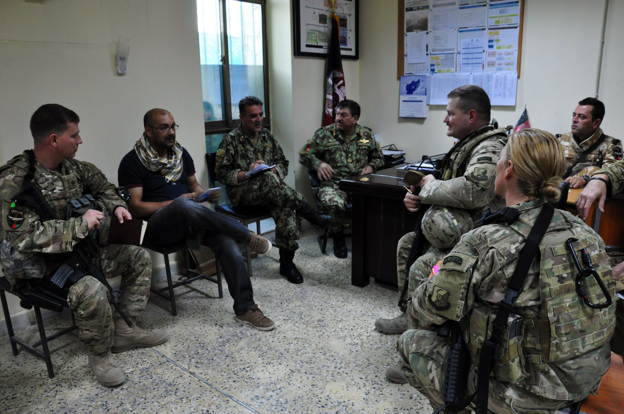 Train, Advice, Assist Command – Air (TAAC-Air) Coalition advisors meet with Afghan Air Force wing operations center and Afghan command and control Center leaders Aug. 31, 2015.  This was the first Afghan-led exercise scenario coordinated and planned between the Kabul WOC and ACCC. The advisors were on-hand to ensure the AAF were on-track to achieve their goals, which were to test their communication flow between their two agencies and their ability to task and launch recovery “exercise” aircraft for a “downed” aircraft. (U.S. Air Force photo by Capt. Eydie Sakura/released)