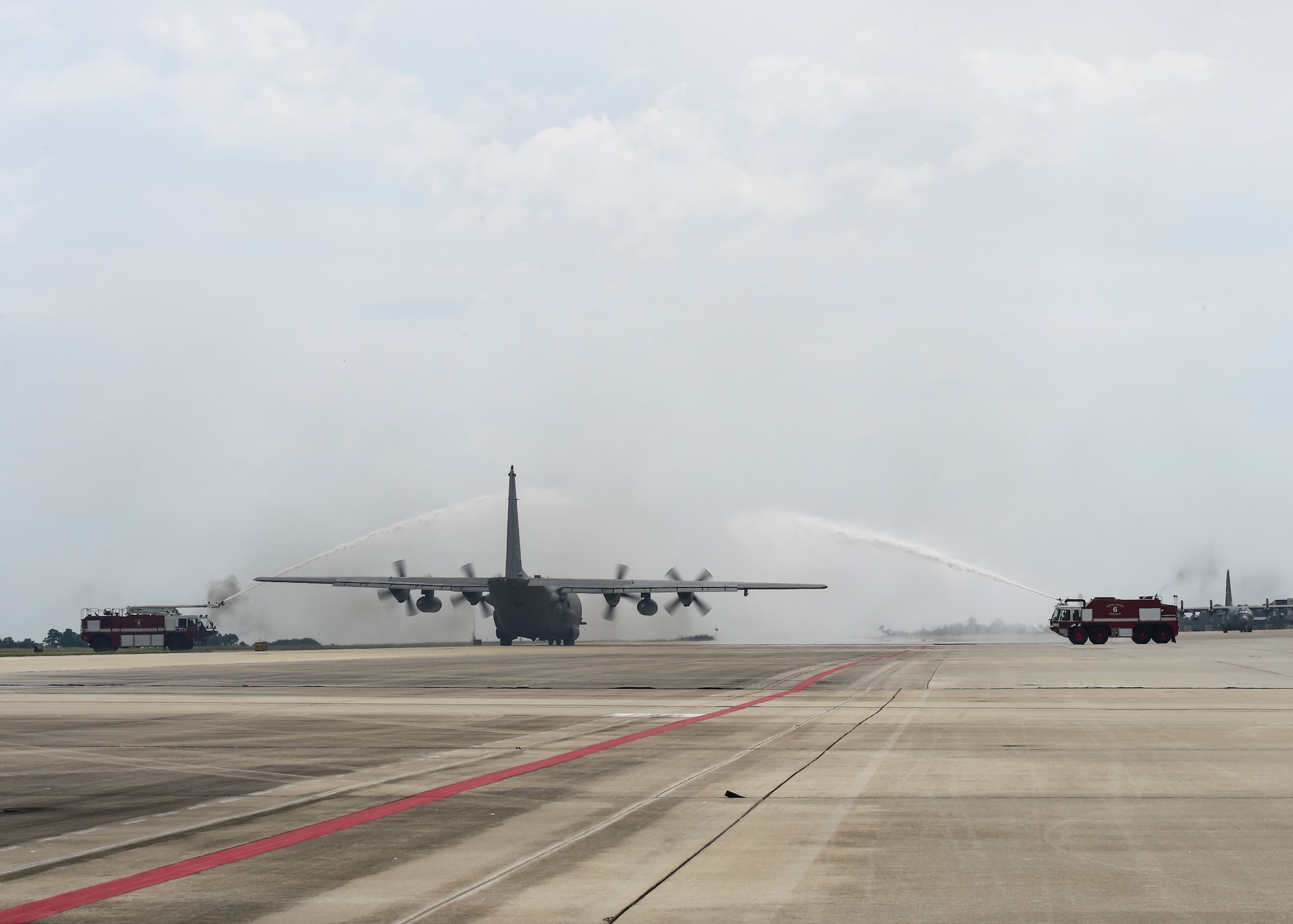 An AC-130U Spooky taxis under a water arch before its retirement flight at Hurlburt Field, Fla., Sept. 21, 2015. The AC-130U Spooky “Bad Omen” is the first “U” model to retire to the Bone Yard at Davis-Monthan Air Force Base, Az. “Bad Omen” was delivered to Hurlburt Field on Feb. 17, 1995, during which time it flew more than 2,300 sorties with approximately 5,600 landings and more than 10,000 hours of flight time.  (U.S. Air Force photo by Airman Kai White)