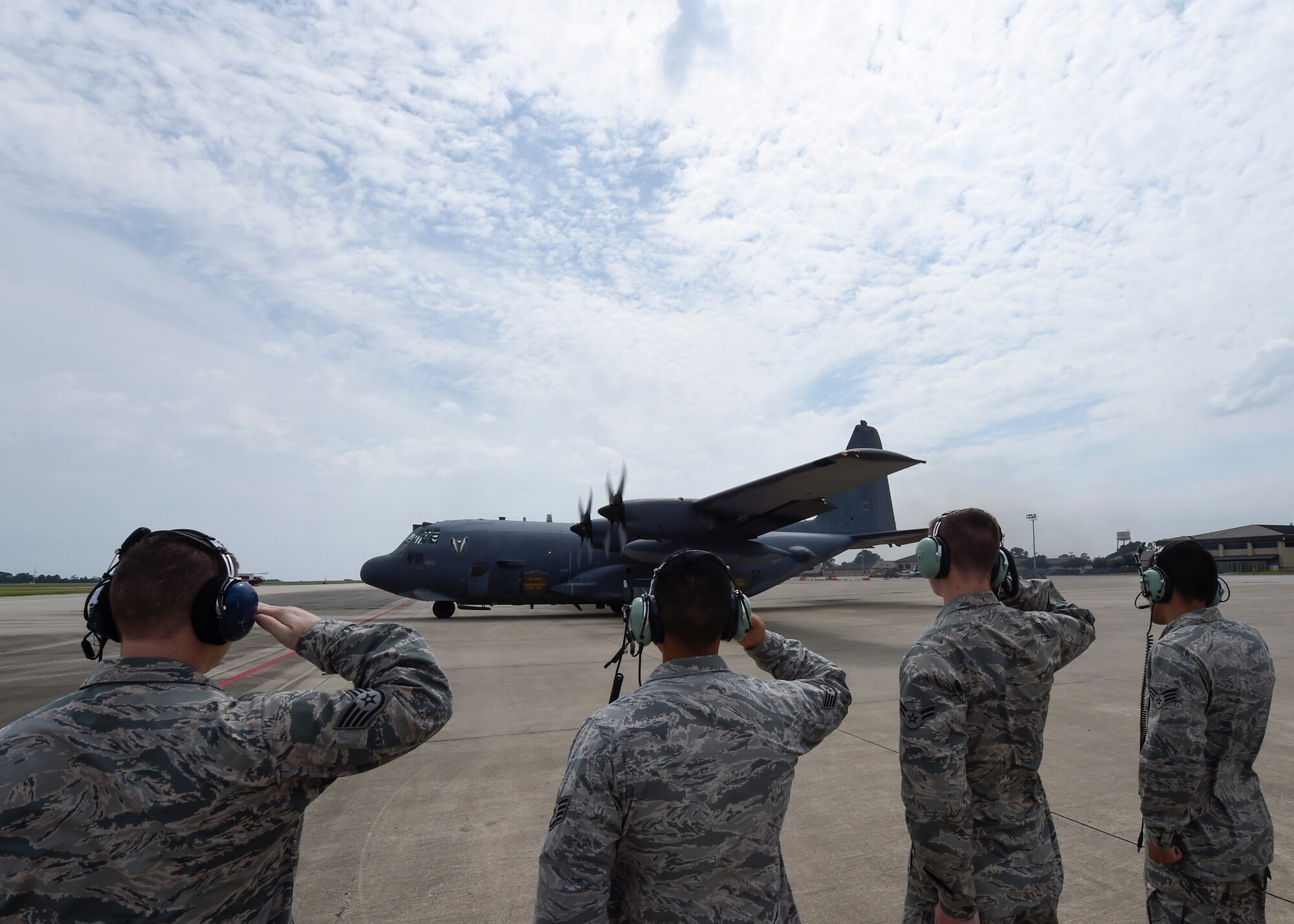 Airmen with the 1st Special Operations Aircraft Maintenance Squadron render a final salute to an AC-130U Spooky before its retirement flight at Hurlburt Field, Fla., Sept. 21, 2015. Tail number 0163, “Bad Omen,” was retired Sept. 21, 2015, after more than 20 years of service. “Bad Omen” last deployed to Bagram Airfield, Afghanistan in December 2013 where it accumulated approximately 600 combat hours and flew more than 100 sorties. (U.S. Air Force photo by Airman Kai White)