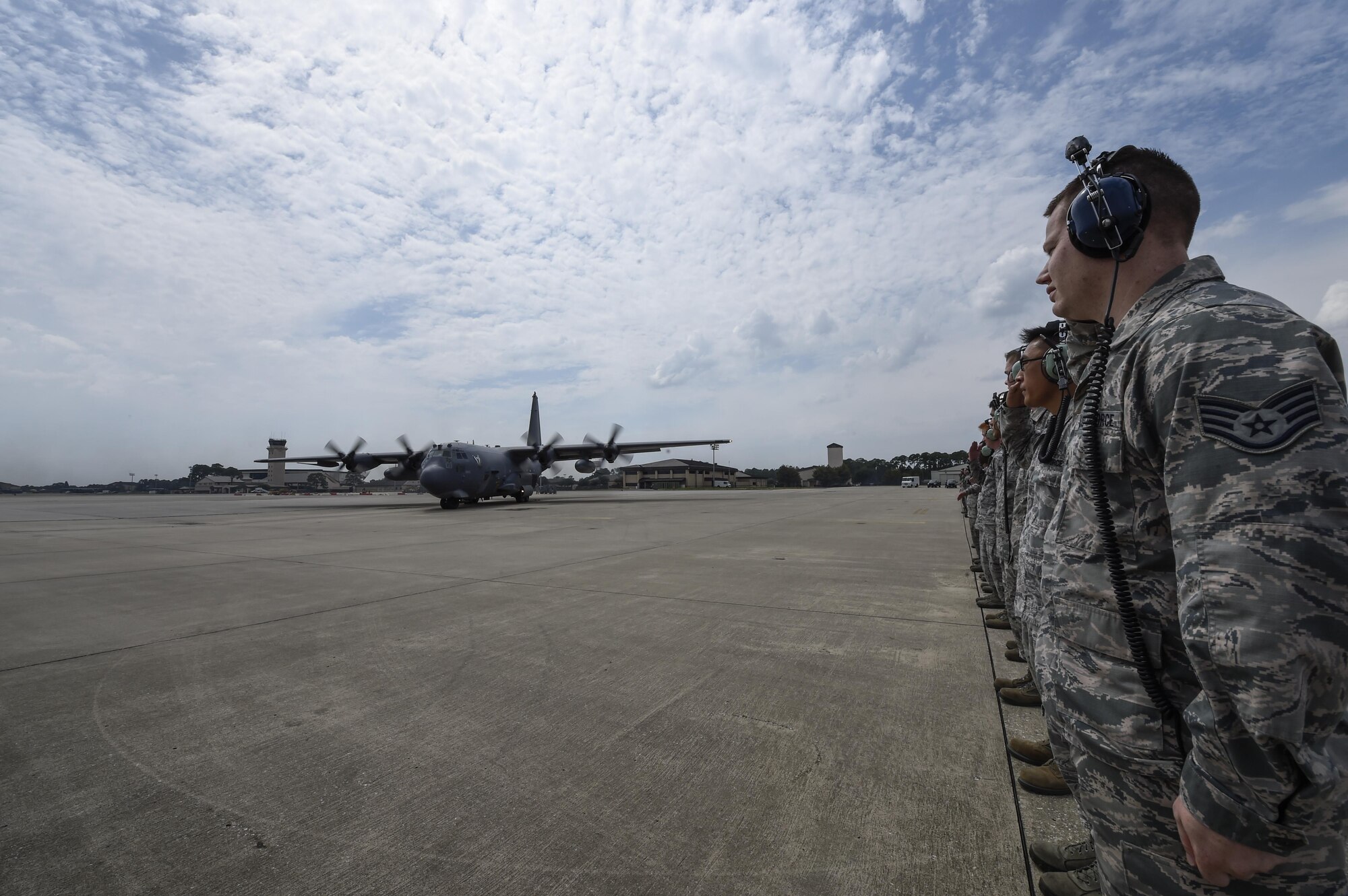 Airmen with the 1st Special Operations Aircraft Maintenance Squadron render a salute to an AC-130U Spooky before its retirement flight at Hurlburt Field, Fla., Sept. 21, 2015. Tail number 0163, “Bad Omen,” was retired Sept. 21, 2015, after more than 20 years of service. “Bad Omen” last deployed to Bagram Airfield, Afghanistan in December 2013 where it accumulated approximately 600 combat hours and flew more than 100 sorties. (U.S. Air Force photo by Airman Kai White)