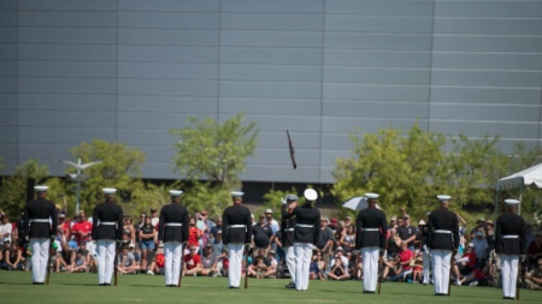 The United State Marine Corps Silent Drill Platoon demonstrates its precise rifle manual at the fields behind the University of Phoenix Stadium at Glendale, Arizona, Sept. 11, 2015. The demonstration was part of Marine Week Phoenix, which allows the Marine Corps to showcase its traditions, history, and values.