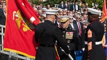 Commandant of the Marine Corps Gen. Robert B. Neller, center, accepts the Marine Corps colors from Gen. Joseph F. Dunford Jr. at Marine Barracks Washington, D.C., Sept. 24, 2015. Neller assumed command from Dunford as the 37th Commandant of the Marine Corps. (U.S. Marine Corps Combat Camera photo by Sgt. Melissa Marnell/Released)