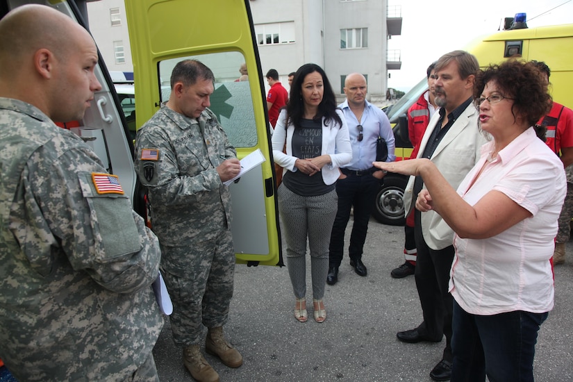 Left to right, Army Pfc. Carl Youngblood, a civil affairs specialist, Army Maj. Kevin Kaufman, chief of the civil affairs planning team, both with 457th Civil Affairs Battalion, 7th Civil Support Command and Diana Marsic, a U.S. Embassy-Croatia liaison/ Humanitarian Assistance project coordinator meet with Croatian medical personnel while assessing European Command’s Humanitarian Assistance funded defibrillators and medical equipment, Sept. 11, 2015, in Split, Croatia. They met with Dr. Leo Luetic, chief physician and the director of the Institute for Emergency Medicine Split-Dalmatian County, and Dr. Radmila Majhen Ujevic, a physician at the Institute.