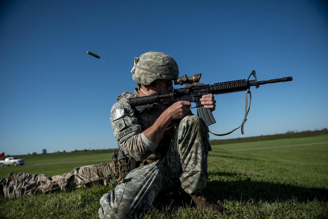 Staff Sgt. Chris Volmer, of Boise State, Idaho, U.S. Army Reserve International Combat Team shooter, takes a shot during the Rifle International Match in which shooters rush forward 100 meters at a time to engage targets in various firing positions during the 2015 Canadian Armed Forces Small Arms Concentration at the Connaught Range outside of Ottawa, Canada, Sept. 15. The marksmanship competition brought in more than 250 total competitors from the British, Canadian and U.S. armed forces competing in more than 50 matches involving rifle, pistol and light machine gun events using various combat-like movements and scenarios. (U.S. Army photo by Master Sgt. Michel Sauret)