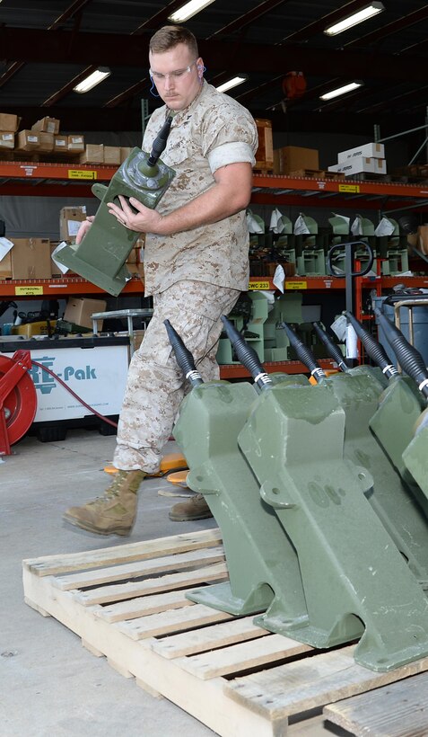 Lance Cpl. Jimmy Collins, ground radio intermediate repairer, Detachment 4, Combat Logistics Battalion-451, prepares an amphibious assault vehicle antenna for storage at Marine Depot Maintenance Command during his annual training aboard Marine Corps Logistics Base Albany, Sept. 22.
