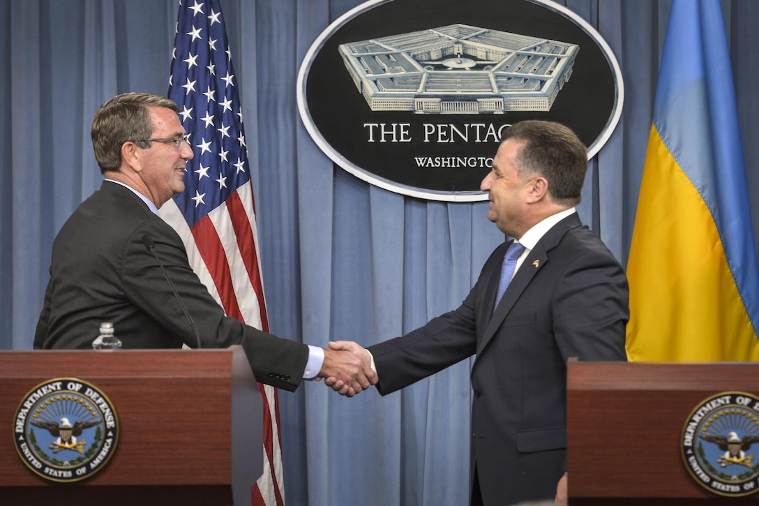 U.S. Defense Secretary Ash Carter and Ukrainian Defense Minister Col.-Gen. Stepan Poltorak shake hands during a joint press conference after meeting to discuss matters of mutual importance at the Pentagon, Sept. 24, 2015. DoD photo by Glenn Fawcett