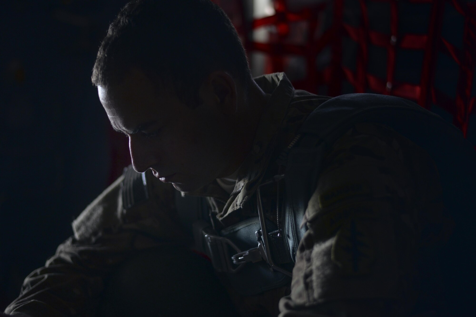 U.S. Army Staff Sgt. Jason Mullaney, 1st Battalion, 1st Special Forces Group (Airborne), prepares to conduct an airdrop jump demonstration from a C-130 Hercules over Yokota Air Base, Japan, during the Japanese-American Friendship Festival, Sept. 19, 2015. The demonstration was one of many events during the weekend that showcased U.S. military capabilities. (U.S. Air Force photo by Airman 1st Class Delano Scott/Released)