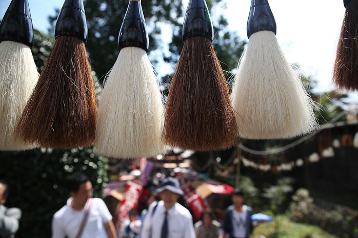 The streets of Kumano, Hiroshima Prefecture Japan, are covered with brush decorations to celebrate the “Fude Matsuri,” a Japanese Calligraphy Brush Festival, Sept. 23, 2015. This festival is held every autumn equinox in the capital of brushes, where locals and even residents from Marine Corps Air Station Iwakuni, visit to learn about Kumano-fude’s history, see the “fude-shi” brush-making craftsman and buy hand-made souvenirs. 


