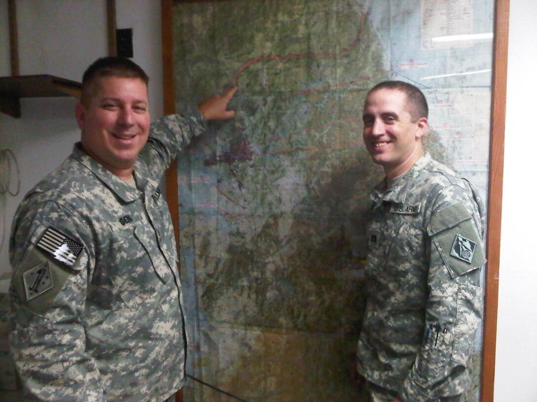 Master Sgt. Michael Geho, POF Operations Center NCOIC, and Capt. Russ McNear, Battle Captain, are tracking exercise events during their participation in the U.S. Forces Korea exercise, Ulchi Freedom Guardian (UFG) 15.