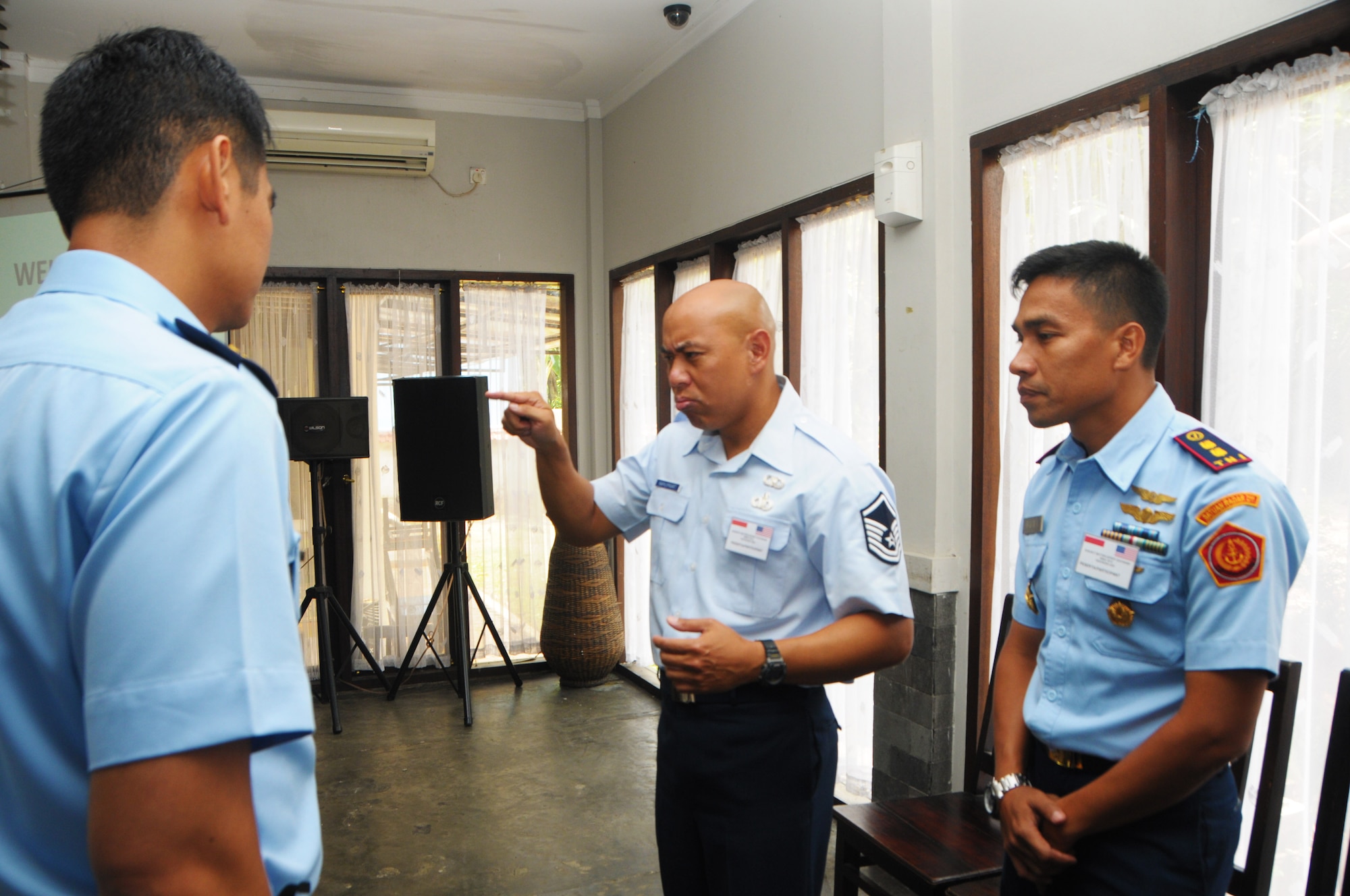 Tech. Sgt. Michael Namumnart, Air Defense Technician with the 169th Air Defense Squadron disucsses target indentification with members of the Kohanudnas, the Indonesian Armed Forces component responsible for air defense, Sept. 17, 2015, Jakarta, Indonesia. As part of the National Guard's State Partnership Program, members of the HIANG participated in an air defense subject matter expert exchange with counterparts from Indonesia. (U.S. Air National Guard photo by Senior Airman Orlando Corpuz/released)