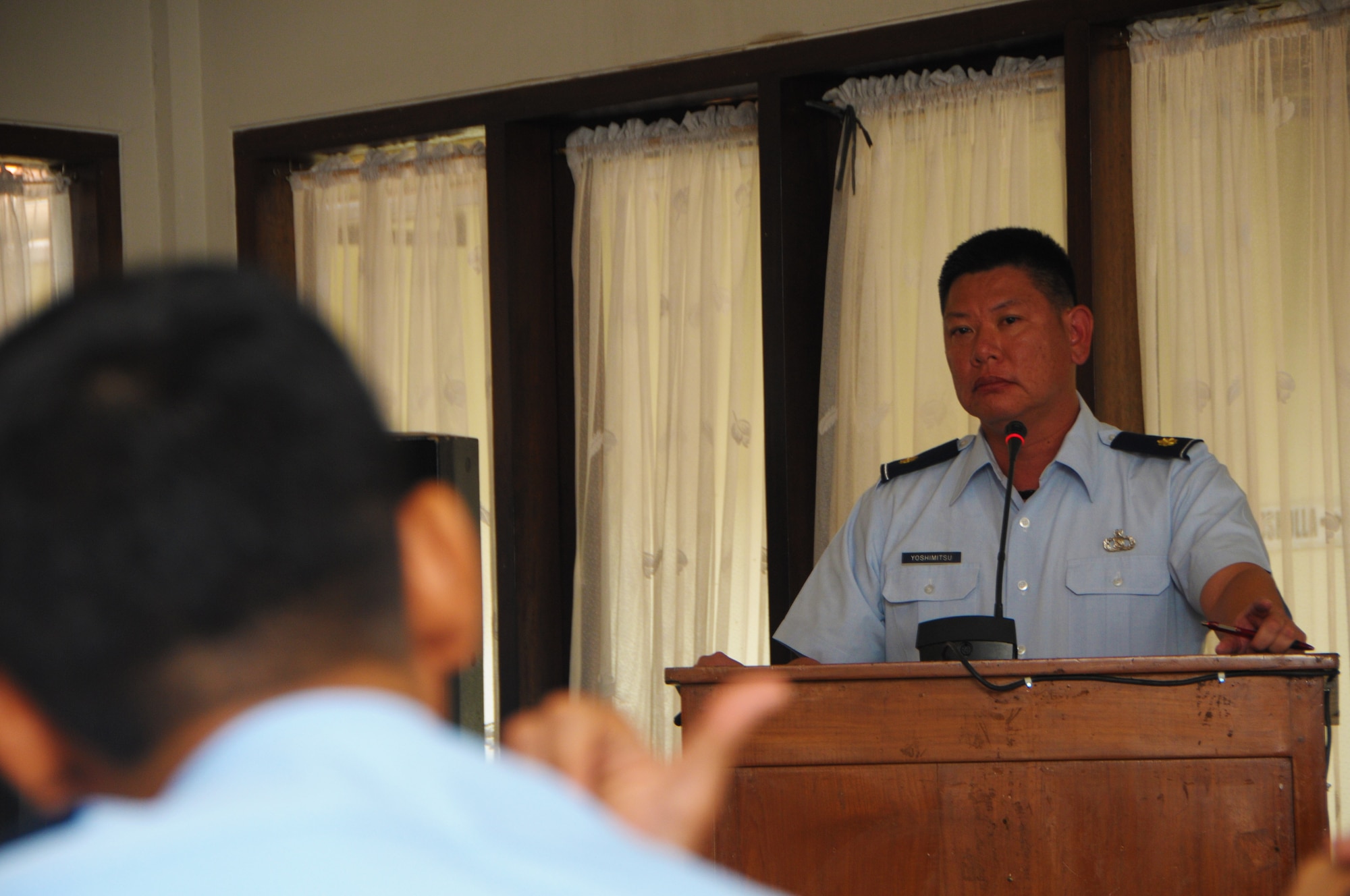 Maj. Colin Yoshimoto, an air battle manager with the 169th Air Defense Squadron, fields questions from a member of Kohanudnas, Sep. 16, 2015, Jakarta, Indonesia. Kohanudnas is the air defense component of the Indonesian armed forces. As part of the National Guard's State Partnership Program, members of the HIANG participated in an air defense subject matter expert exchange with counterparts from Indonesia. (U.S. Air National Guard photo by Senior Airman Orlando Corpuz/released)