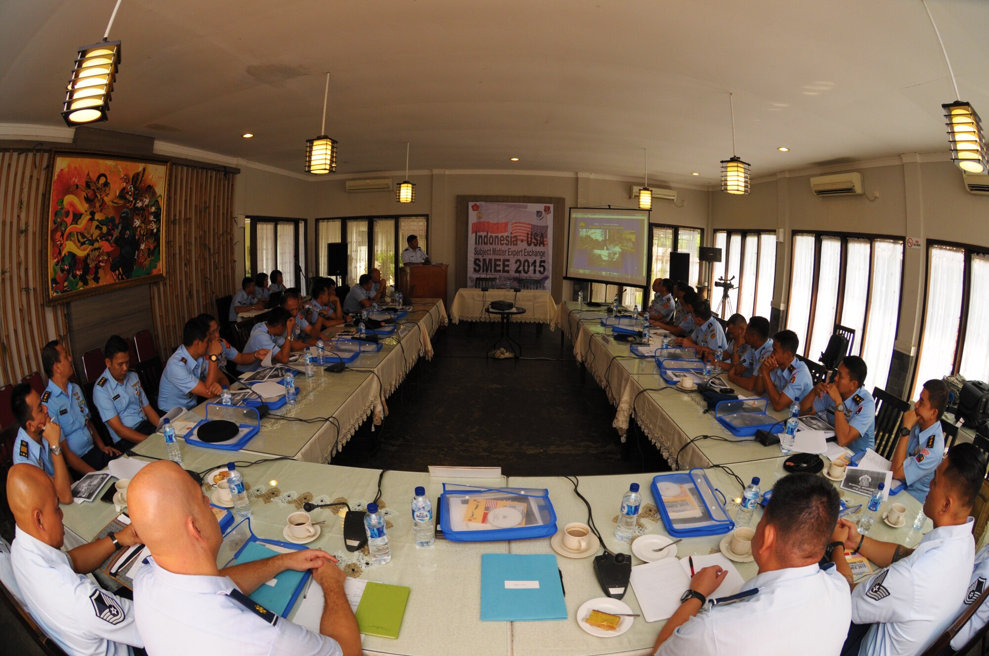 Air defense experts from the Hawaii Air National Guard and the Kohanudnas, the Indonesian armed forces component tasked with air defense, discuss air battle management during an air defense subject matter expert exchange, Sept. 15, 2015, Jakarta, Indonesia. As part of the National Guard's State Partnership Program, members of the HIANG participated in an air defense subject matter expert exchange with counterparts from Indonesia. (U.S. Air National Guard photo by Senior Airman Orlando Corpuz/released)
