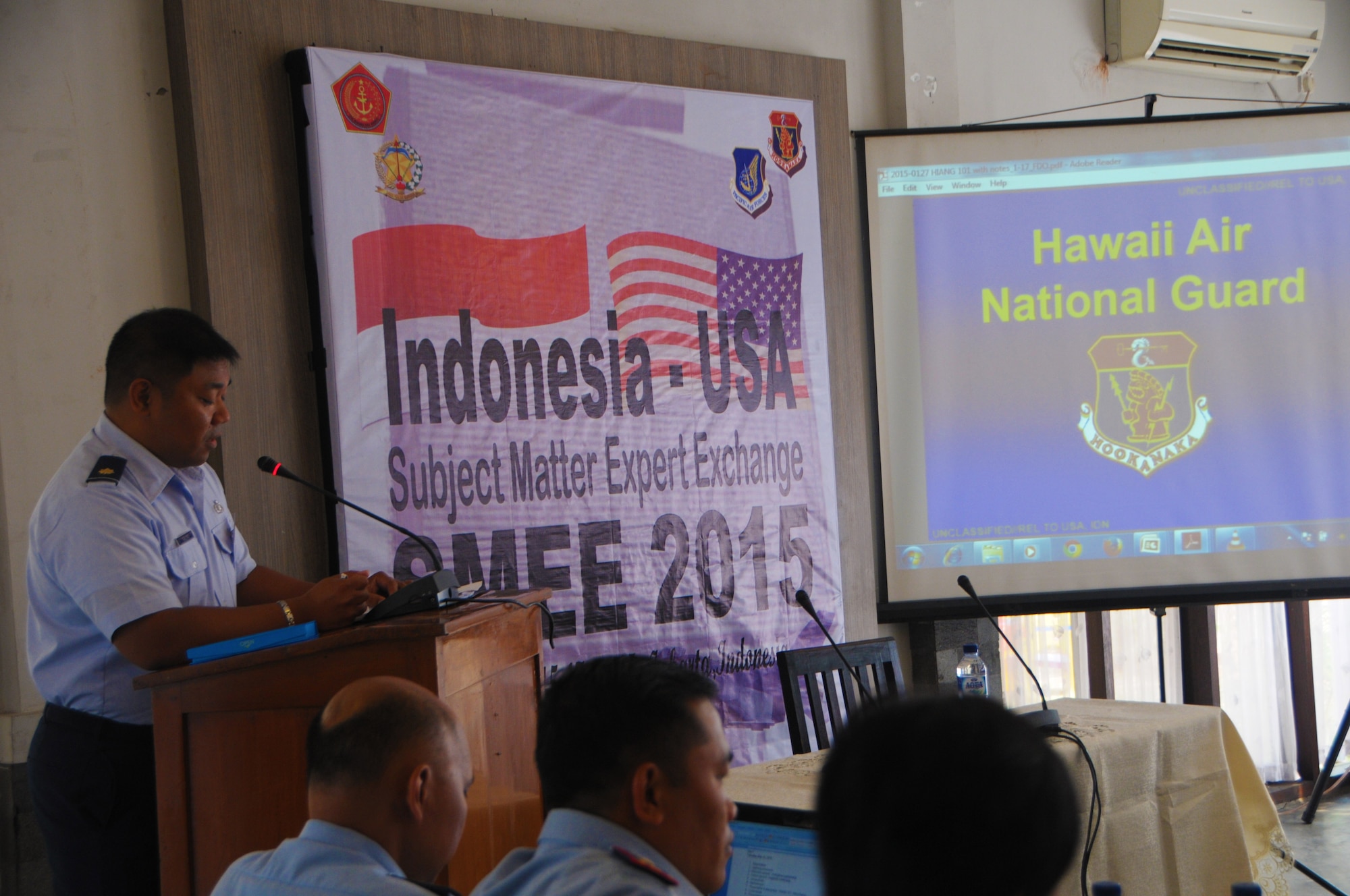 Maj. Robert Galino, Theatre Command and Control officer with the 109th Air Operations Group, conducts a brief on the Hawaii Air National Guard to members of Kohanudnas, Sept. 15, 2015, Jakarta, Indonesia. Kohanudnas is the air defense component of the Indonesian armed forces. As part of the National Guard's State Partnership Program, members of the HIANG participated in an air defense subject matter expert exchange with counterparts from Indonesia. (U.S. Air National Guard photo by Senior Airman Orlando Corpuz/released)