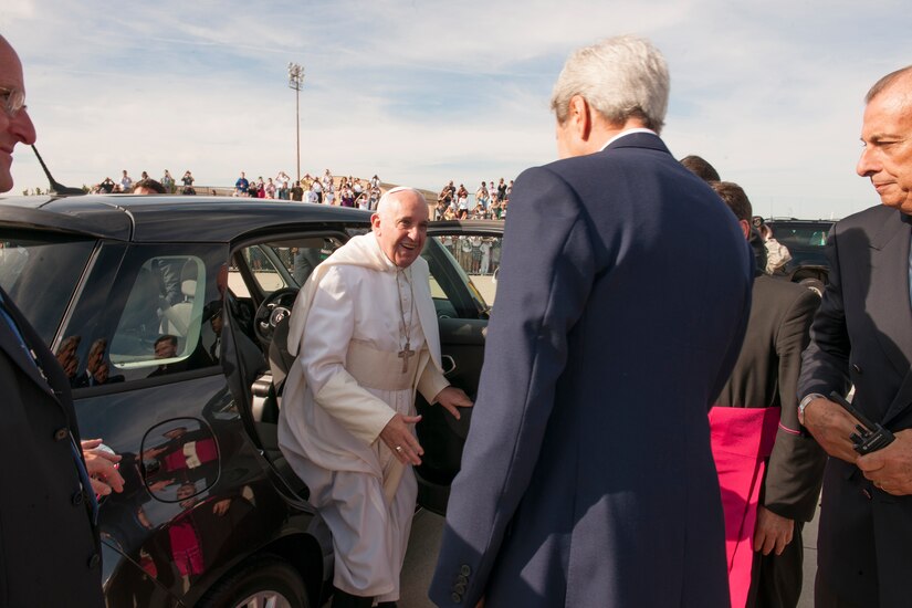 Secretary of State John Kerry greets Pope Francis at Joint Base Andrews, Md., Sept. 24, 2015. The pope will visit New York and Philadelphia during his U.S. trip before returning to Rome Sept. 27. (U.S. Air Force photo/Tech. Sgt. Robert Cloys)