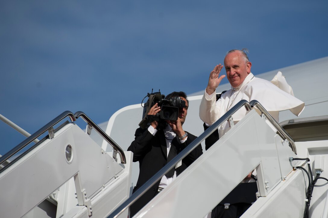 Pope Francis waves to the crowd gathered at Joint Base Andrews, Sept. 24, 2015 as he prepares to depart for New York. The pope will also visit Philadelphia during his U.S. trip before returning to Rome Sept. 27. (U.S. Air Force photo/Tech. Sgt. Robert Cloys)