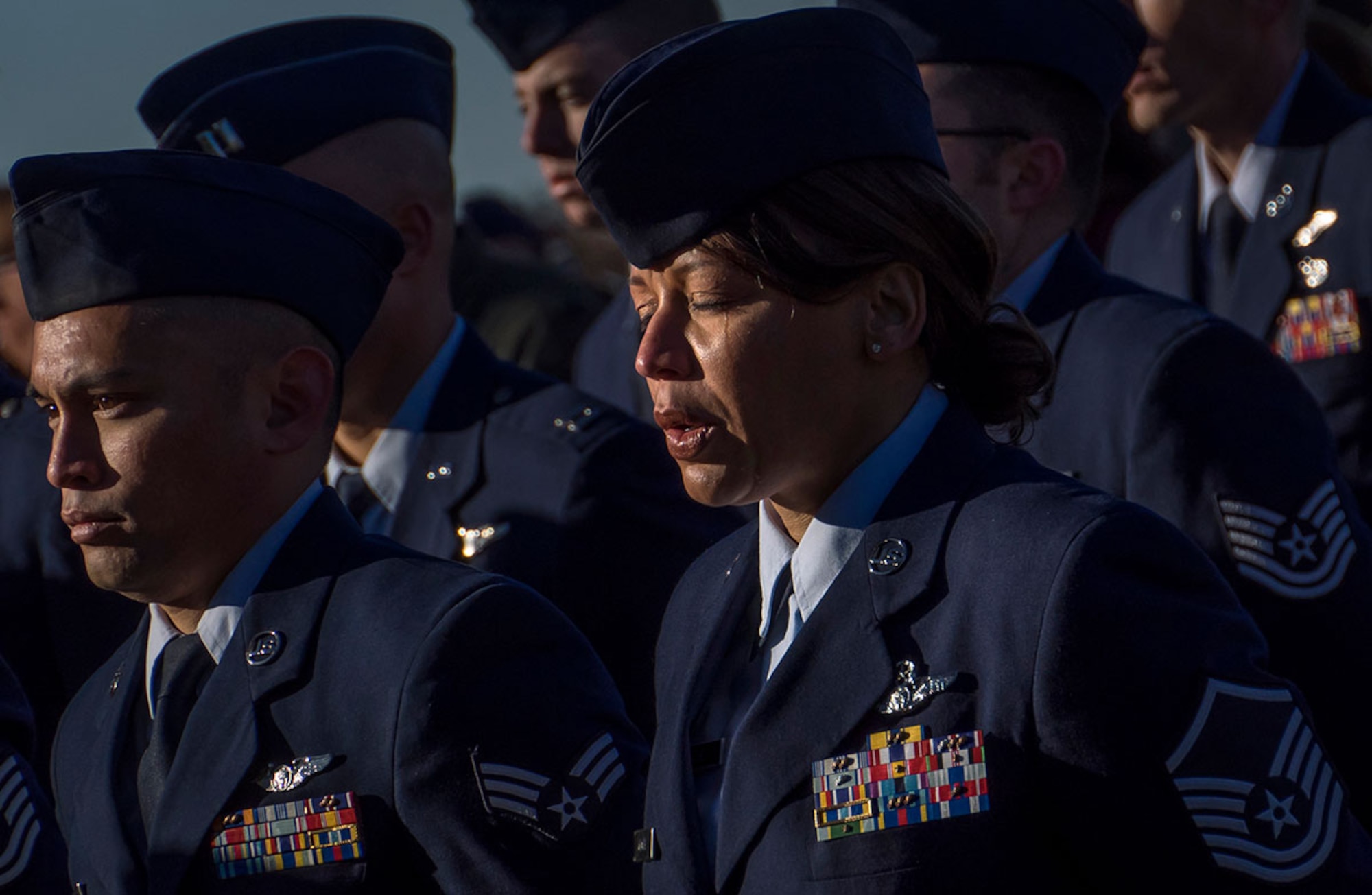 Master Sgt. Torey Moore, an Air Surveillance Technician assigned to the 962nd, shows emotion during the Yukla 27 memorial. (U.S. Air Force photo/Justin Connaher)
