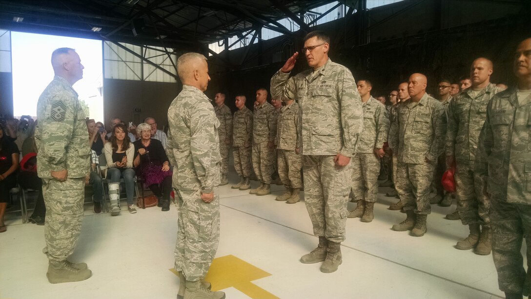 New Mexico Air National Guard Lt. Col. Thomas Benton, right, commander of the 210th Rapid Engineer Deployable Heavy Operational Repair Squadron Engineers, salutes New Mexico National Guard Adjutant General Brig. Gen. Andrew Salas at a ceremony. (Photo by Ryan Stark)