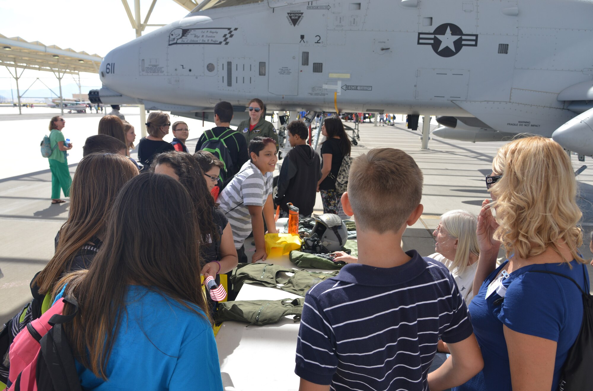 Youth participants of the New Mexico Aviation Aerospace Career Expo at Kirtland are shown an A-10 Warthog. The expo educates New Mexico youth with information on pursuing a career in the aviation and aerospace industry. (Photo by Todd Berenger)

