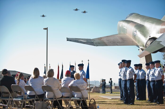A trio of F-16 Fighting Falcons perform the “missing man” formation during the Prisoners of War/Missing in Action Recognition Ceremony at Nellis Air Force Base, Nev., Sept. 18, 2015. The missing man formation is an aerial salute to those that have paid the ultimate sacrifice. A position in the formation is vacant to represent that one person is missing, just like so many of the nation’s heroes that have gone missing in the fight for America’s freedom. (U.S. Air Force photo by Staff Sgt. Siuta B. Ika)