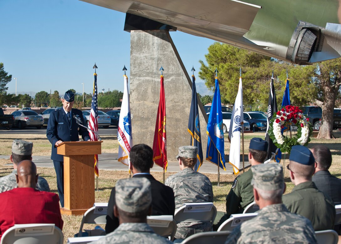 Brig. Gen. Christopher Short, 57th Wing commander, speaks during the Prisoners of War/Missing in Action Recognition Ceremony at Nellis Air Force Base, Nev., Sept. 18, 2015. During the ceremony, Short said that the day was not just a day to honor former POWs and those MIA, but to acknowledge that the U.S. is still a nation at war and that more Americans may still be captured by our nation’s enemies or potentially become MIA. (U.S. Air Force photo by Staff Sgt. Siuta B. Ika)