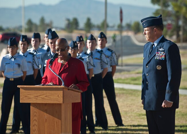 Willette Gerald, deputy director of the Nevada Department of Veterans Services, presents a proclamation from Nevada Governor Brian Sandoval to Brig. Gen. Christopher Short, 57th Wing commander, during the Prisoners of War/Missing in Action Recognition Ceremony at Nellis Air Force Base, Nev., Sept. 18, 2015. Short also spoke at the event and thanked those who came out to honor the commitment and sacrifices made by the nation’s prisoners of war and those missing in action. (U.S. Air Force photo by Staff Sgt. Siuta B. Ika)