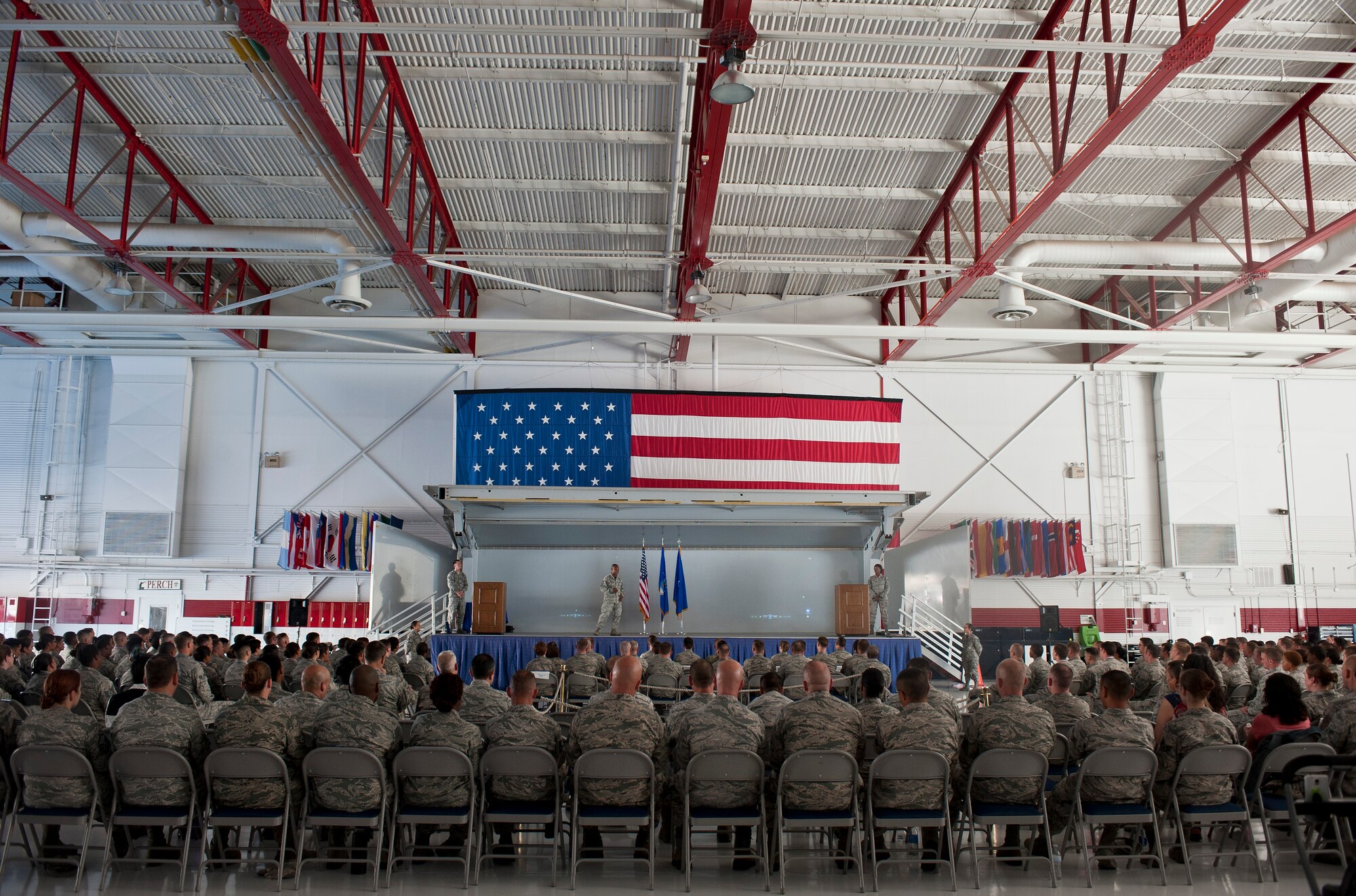 Chief Master Sgt. Kenneth Lindsey, U.S. Air Force Warfare Center command chief, speaks to attendees of the first ever NCO induction ceremony at Nellis Air Force Base, Nev., Sept. 18, 2015. Approximately 380 staff sergeant selects were in attendance, not including Airmen assigned to Creech AFB. The day prior to the ceremony, the inductees participated in seminars with various briefings to help guide them onto the path to becoming successful NCOs. (U.S. Air Force photo by Airman 1st Class Mikaley Kline)