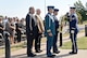 During a Sept. 22 ceremony, Col. David Gaedecke, 552nd Air Control Wing commander, receives a wreath from a member of Tinker’s Honor Guard to place at the foot of the Yukla 27 Memorial. Assisting with the wreath laying are, from left, retired Master Sgt. Ken Lybolt, who was the crew chief for the Yukla; retired Col. Wylie Koiner, former 552nd ACW commander; and Lt. Col. Don “Boc” Saunders, Canadian Detachment commander. The ceremony marked the 20th anniversary of “Yukla two-seven” crashing 42 seconds after takeoff at Elmendorf Air Force Base, Alaska, killing all 24 crew members onboard. (Air Force photo by Kelly White/Released)