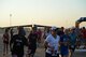 Runners begin the 2015 Half Marathon and 5K, hosted by the 2nd Force Support Squadron, on the flightline at Barksdale Air Force Base, La., Sept. 19, 2015. Nearly 300 participants from on and off base, including runners aged 9-69, as well as kids on bikes and others towed in strollers and wagons, joined to race. (U.S. Air Force photo/Tech. Sgt. Thomas Trower)