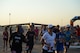 Runners begin the 2015 Half Marathon and 5K, hosted by the 2nd Force Support Squadron, on the flightline at Barksdale Air Force Base, La., Sept. 19, 2015. Nearly 300 participants from on and off base, including runners aged 9-69, as well as kids on bikes and others towed in strollers and wagons, joined to race. (U.S. Air Force photo/Tech. Sgt. Thomas Trower)