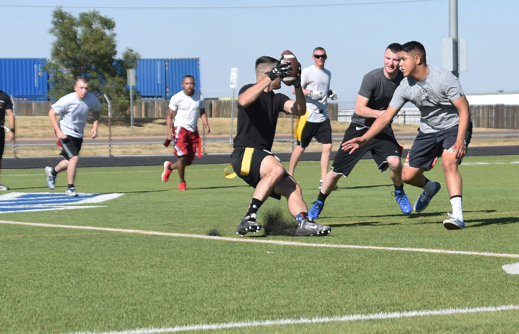 Junior enlisted compete against NCOs in flag football game > Buckley ...