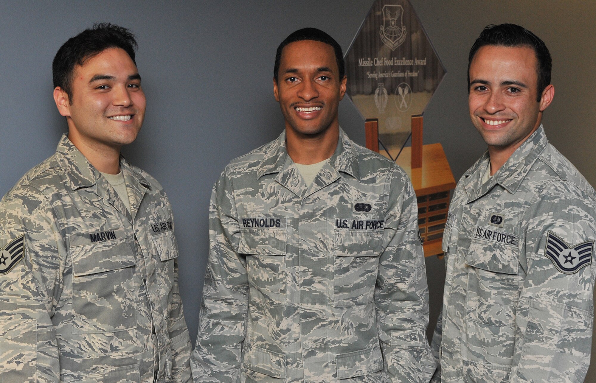 The 341st Missile Wing’s Global Strike Challenge 2015 Outstanding Chef Competition team poses Sept. 22 at Malmstrom Air Force Base, Mont. From left to right are Staff Sgts. Stephen Marvin, team member; Justin Reynolds, team captain; and Derek Cruz, team member. All are from the 341st Force Support Squadron and will compete Oct. 7, 2015, at Barksdale Air Force Base, La. (U.S. Air Force photo/John Turner)