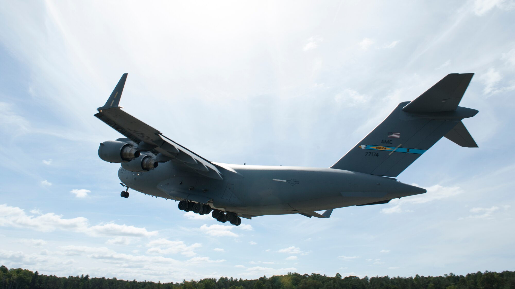 A C-17A Globemaster III, operated by the 3d Airlift Squadron, takes off from a dirt and gravel runway during a semi-prepared runway operations (SPRO) training mission Sept. 23, 2015, at Fort A.P. Hill, Va. A fully loaded C-17 is able to take-off and land on as little as 3,000 feet of runway. (U.S. Air Force photo/Airman 1st Class Zachary Cacicia)