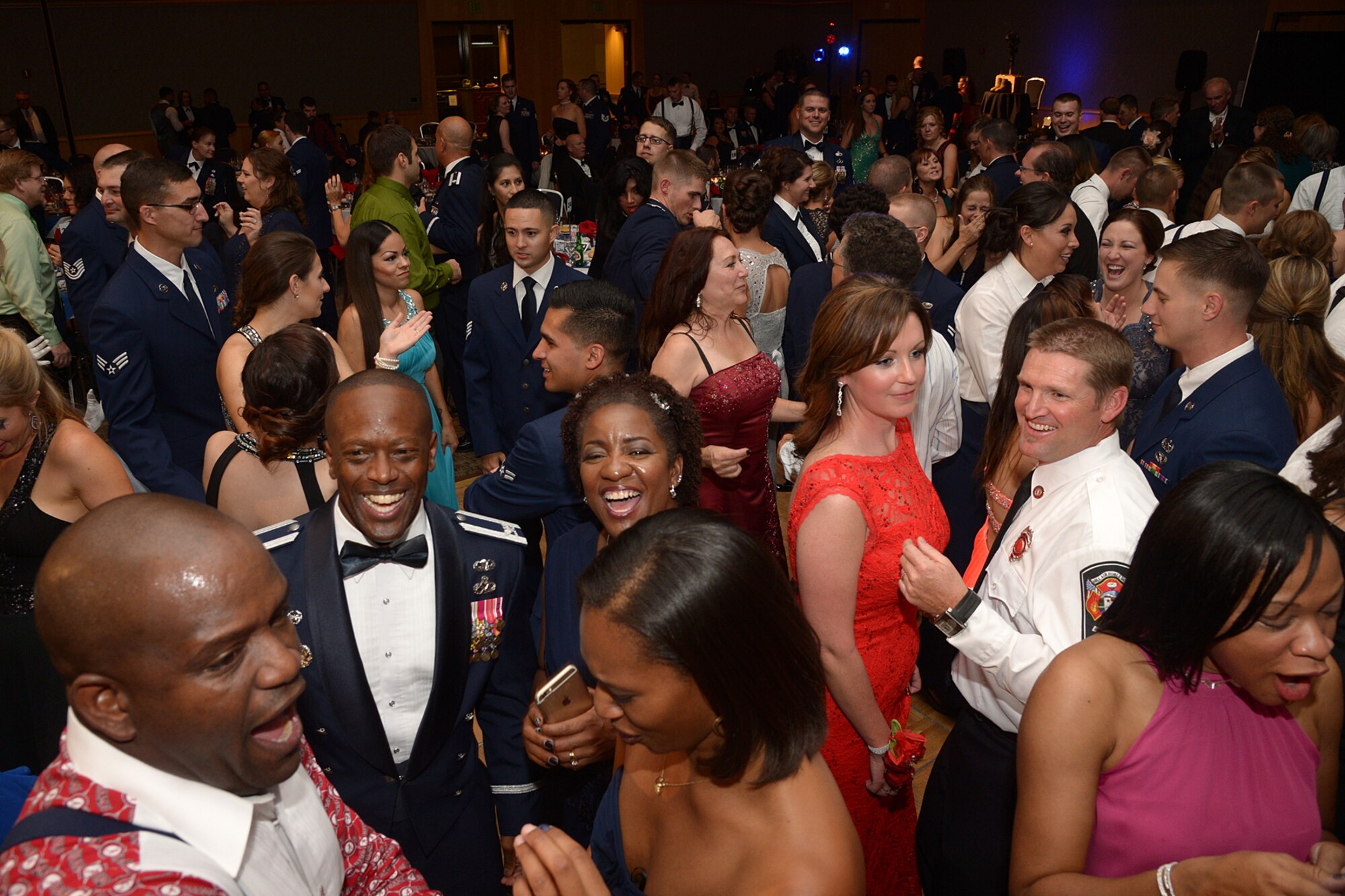 Airmen hit the dance floor during the 2015 Air Force Ball held Sept. 19 at the Eccles Conference Center in Ogden, Utah. Over 600 attended Hill Air Force Base's annual ball. This year the ball celebrated the Air Force's 68th birthday and Hill's 75th. (U.S. Air Force photo/Alex R. Lloyd)