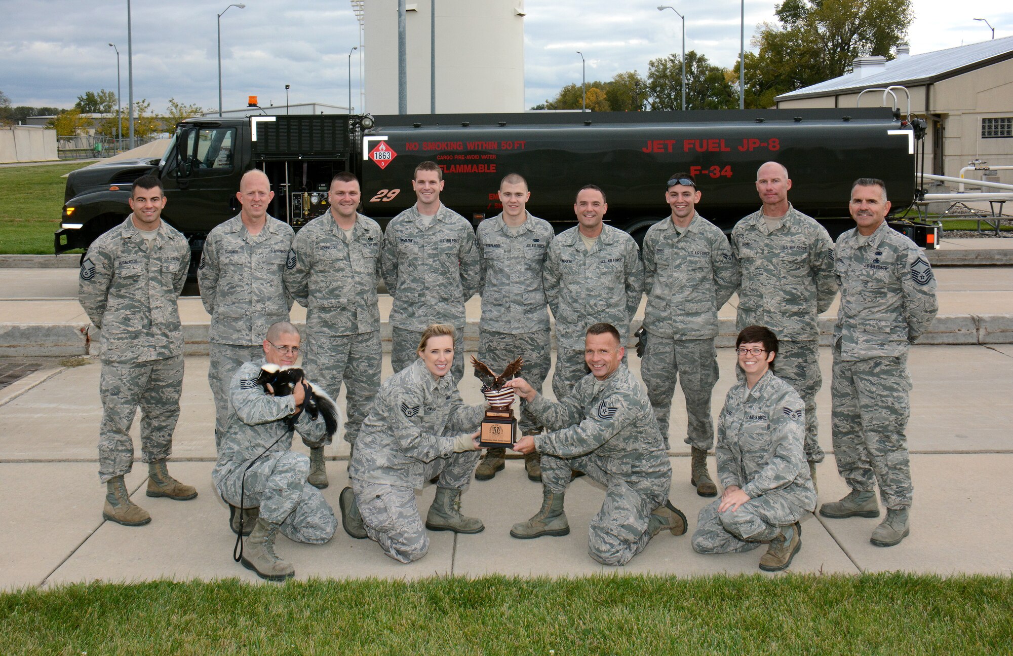 Members of the 115th Fighter Wing Fuels Management Flight pose after being presented the 2014 “Work Center of the Year” award in Madison, Wis., on Oct. 4, 2014.  The section distinguished itself through superior performance in supporting the 115 FW 24/7 Aerospace Control Alert missions, combat training flying operations, and two deployments to Volk Field, Wisconsin, and Red Flag, Alaska, during fiscal year 2014. (Air National Guard photo by Master Sgt. Paul Gorman)
