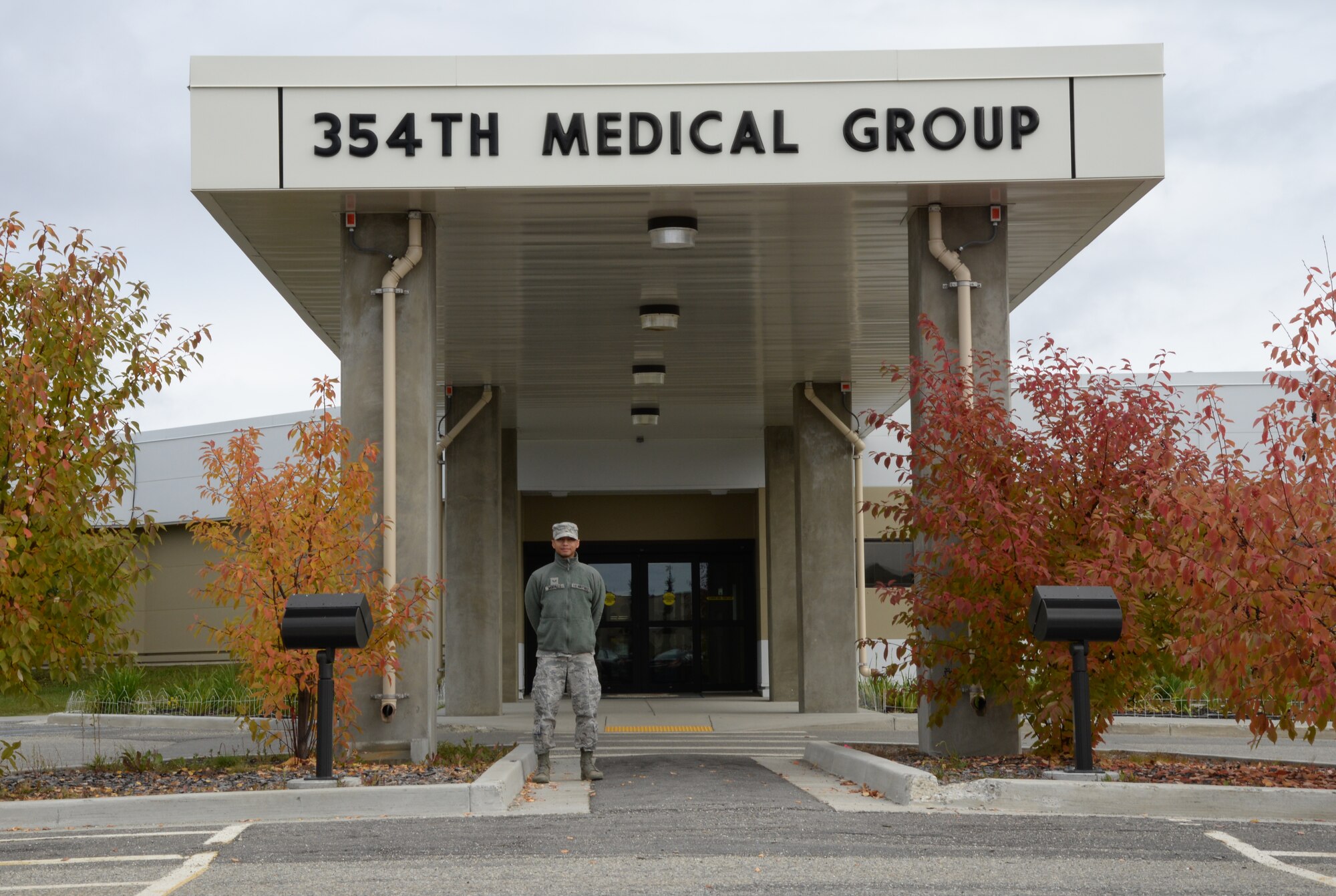 U.S. Air Force Senior Airman Noel Morales, a 354th Medical Support Squadron uniform business office manager, poses under the 354th Medical Group overhang Sept. 23, 2015, at Eielson Air Force Base, Alaska. Morales said his proudest accomplishment is the opportunity given to him by the 354th Fighter Wing Honor Guard. (U.S. Air Force photo by Airman 1st Class Cassandra Whitman/Released)