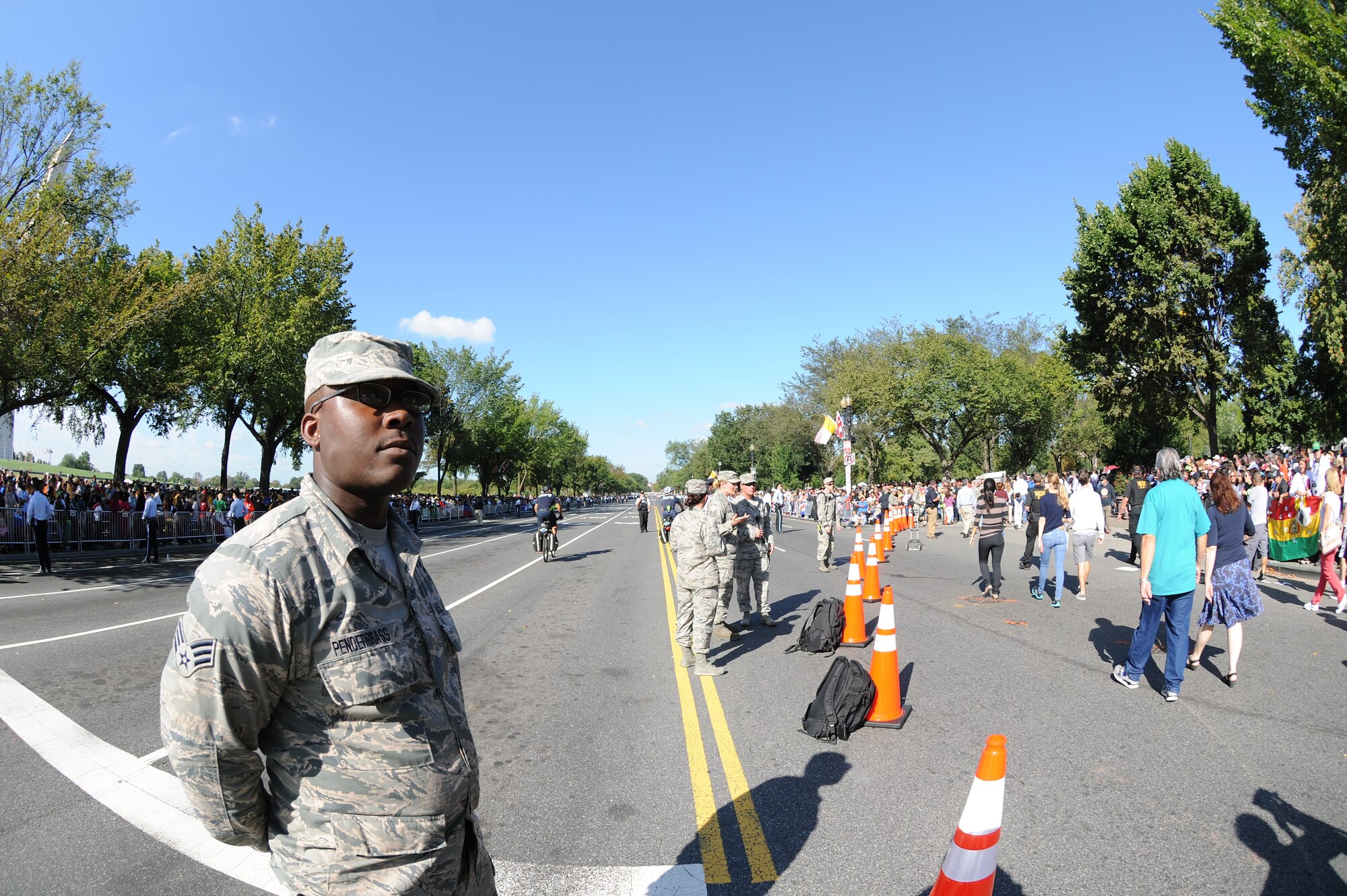 Senior Airman Devonte Pendergrass, 113th Wing, D.C. Air National Guard, patrols at the 2015 Papal Visit in Washington, D.C., Sept. 23. The 113th Wing members volunteered for the domestic operations at the event as crowd control and traffic management. (U.S. Air National Guard photo by Airman 1st Class Anthony Small)
