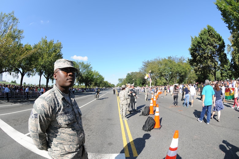 Senior Airman Devonte Pendergrass, 113th Wing, D.C. Air National Guard, patrols at the 2015 Papal Visit in Washington, D.C., Sept. 23. The 113th Wing members volunteered for the domestic operations at the event as crowd control and traffic management. (U.S. Air National Guard photo by Airman 1st Class Anthony Small)
