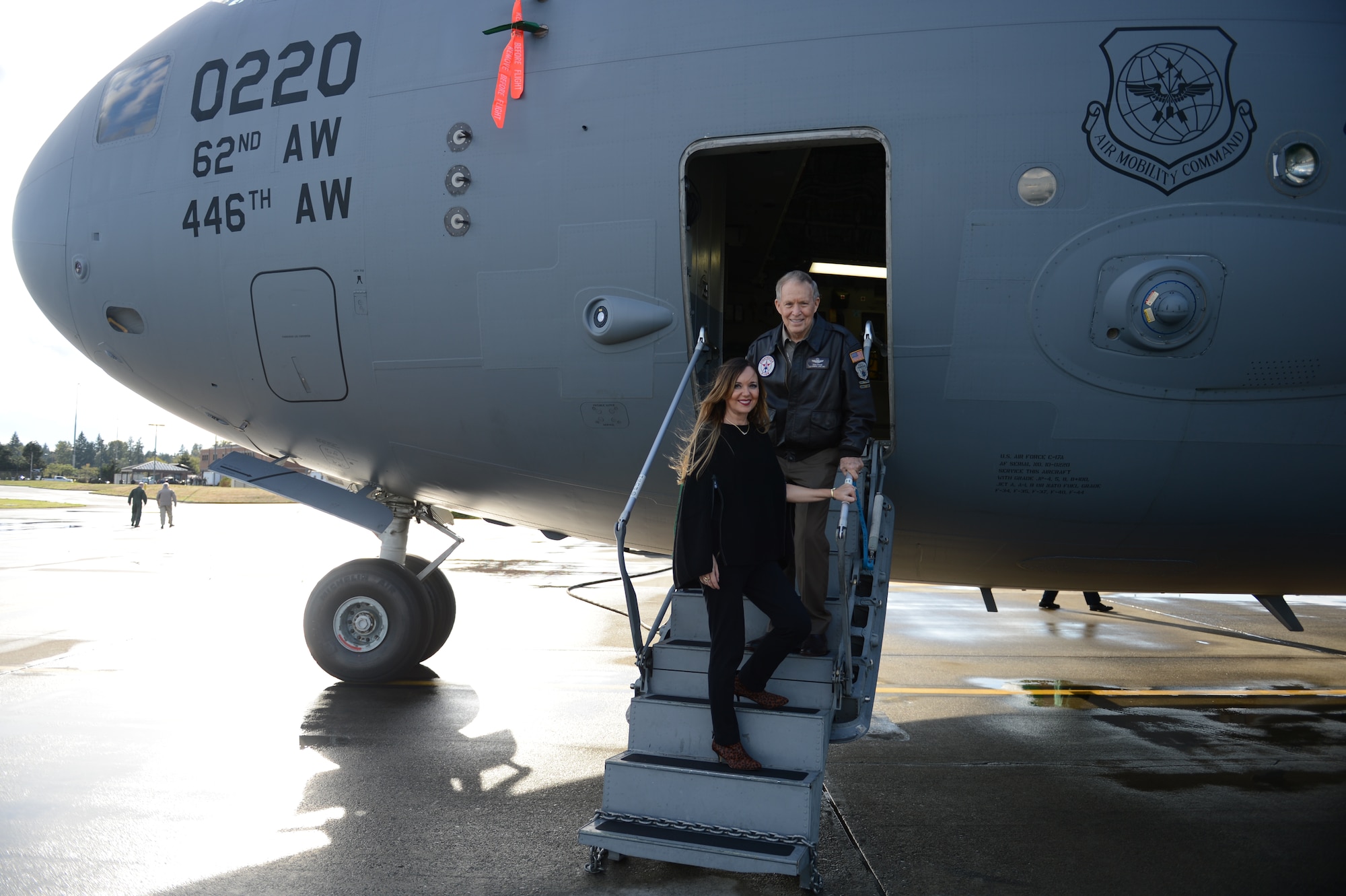 Brig. Gen. (retired) Steve Ritchie and his wife Mariana pose for a photo outside of a Globemaster III C-17 aircraft during a visit to McChord Field, Sept. 17, 2015 at Joint Base Lewis-McChord, Wash. The Ritchie's visited with McChord Airmen to include stops at the First Term Airman's Center, Western Area Defense Sector, the Olympic dining facility and the 4th Airlift Squadron. (U.S. Air Force photo/Staff Sgt. Katie Jackson)