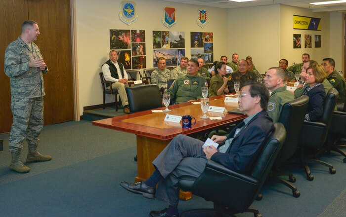 U.S. Air Force Col. Robert Lyman, 628th Air Base Wing commander, briefs the Pacific Air Chiefs on the joint base mission at Joint Base Charleston, South Carolina, Sept. 16, 2015 as part of the Pacific Air Chiefs Symposium. The air chiefs, from Australia, Cambodia, Mongolia, Nepal, Bangladesh, Japan and the Philippines, visited JB Charleston as part of the Pacific Air Chiefs Symposium. The symposium helps further the Air Force's partnership with the countries by showcasing the mission and operations at various Air Force bases around the U.S. (U.S. Air Force photo/Airman 1st Class Thomas T. Charlton)