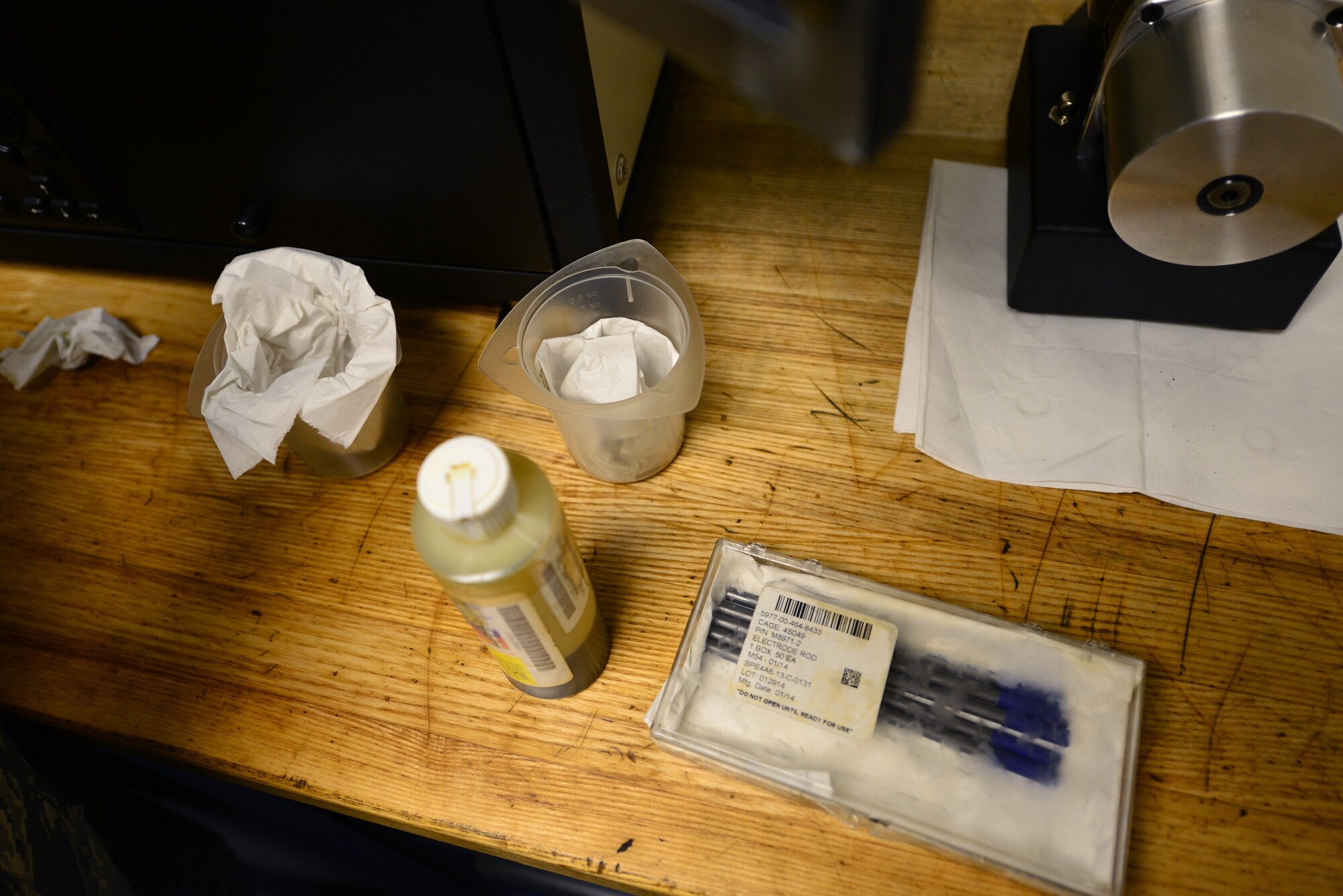 Equipment used to analyze aircraft oil lies on a work bench at Langley Air Force Base, Va., Sept. 22, 2015. Non-destructive inspection Airmen assigned to the 1st Maintenance Squadron test oil samples for metal fragments which enables them to pinpoint the location of a discrepancy within an aircraft engine. (U.S. Air Force photo by Senior Airman Aubrey White/Released)